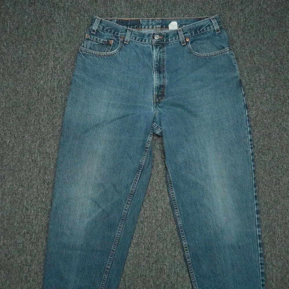 VINTAGE Levis Jeans Mens 34x34 Blue 560 Loose Fit Tapered Leg USA Y2K